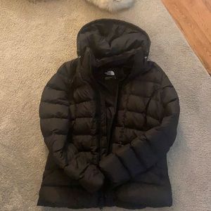 North face puffer coat. Never worn.